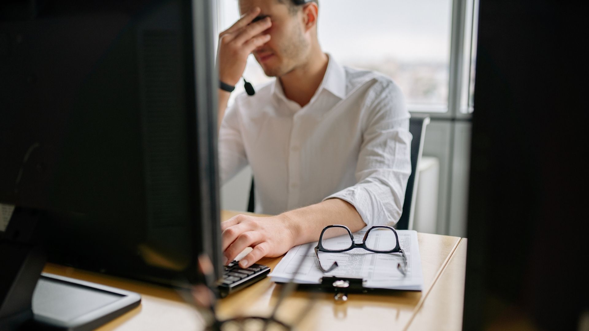 man struggling with mental health at work