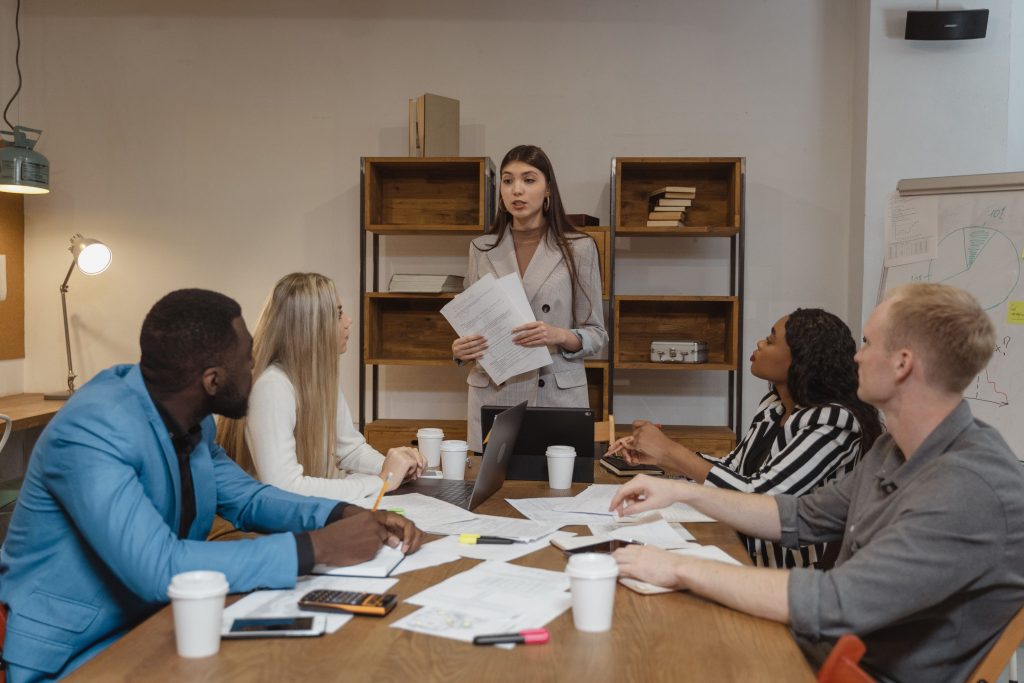 Project manager leading meeting