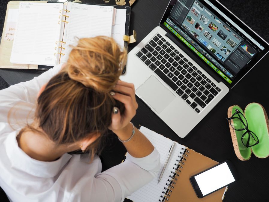 Woman overwhelmed with work