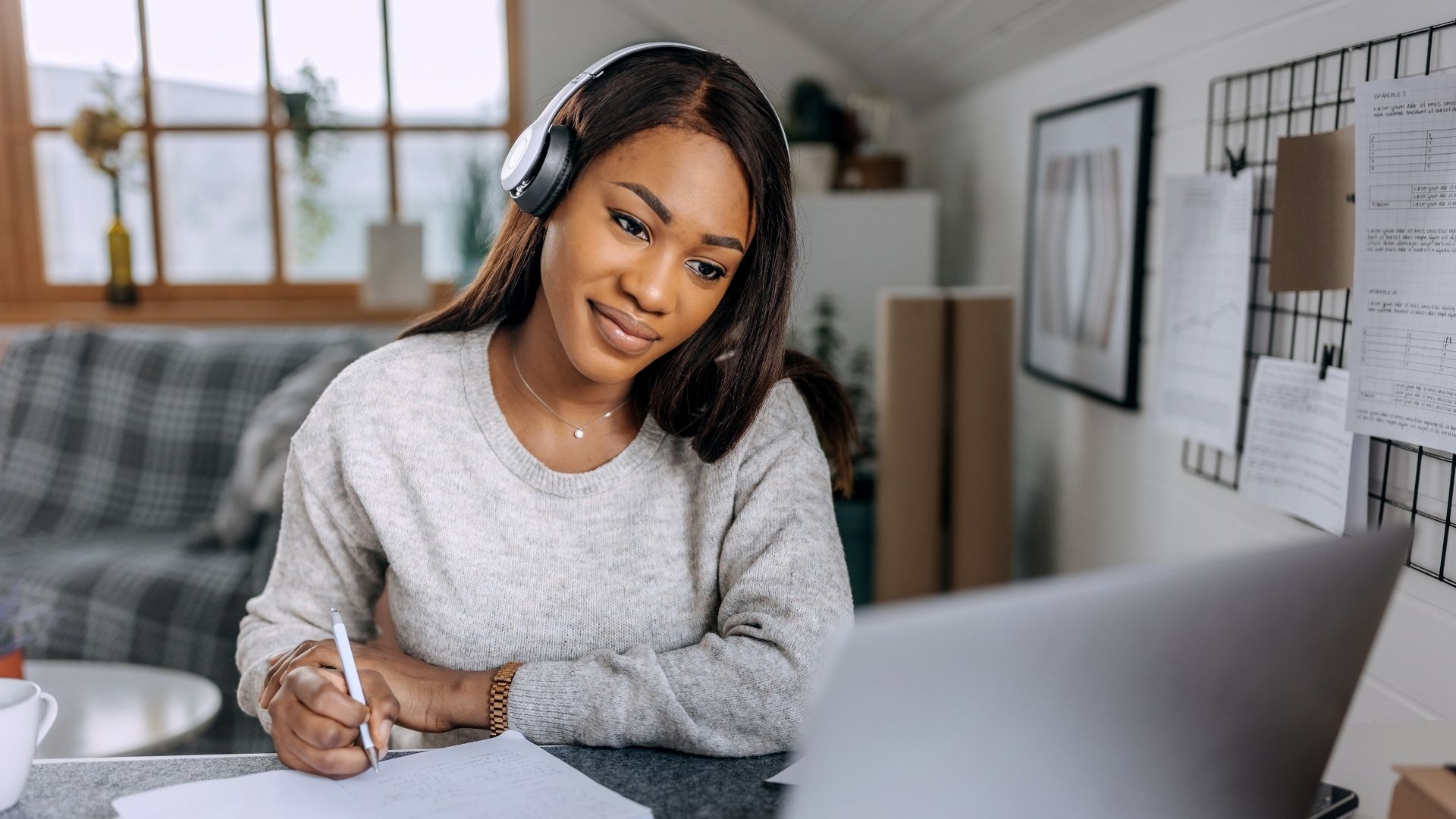 female manager learning at her computer