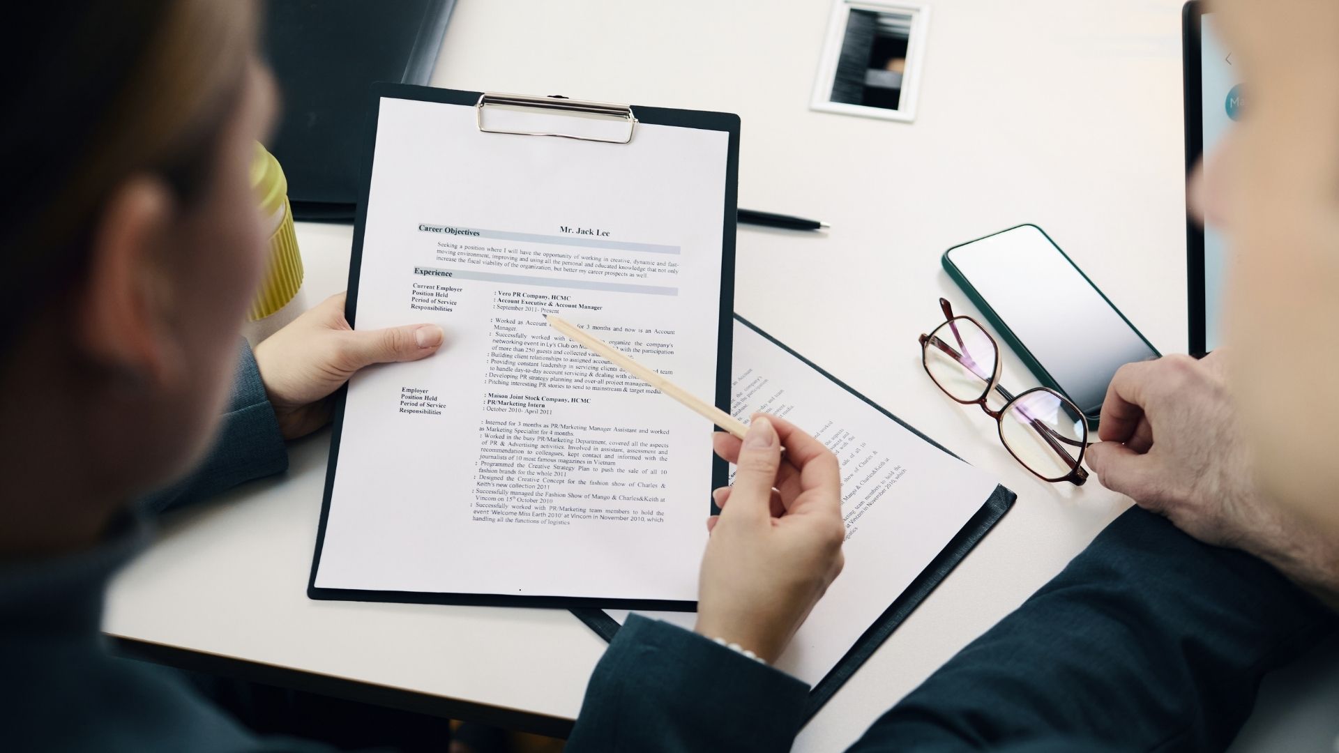 hiring manager looking at a cv