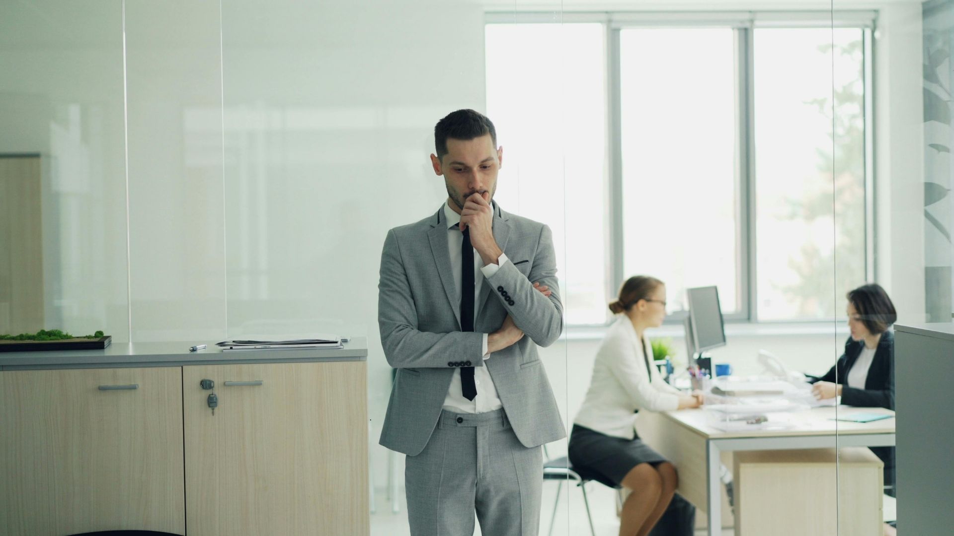 man struggling to make a decision